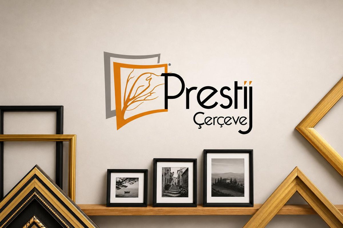 Prestij Çerçeve logo on the wall; black-framed photos on a shelf with gold and black frame mouldings